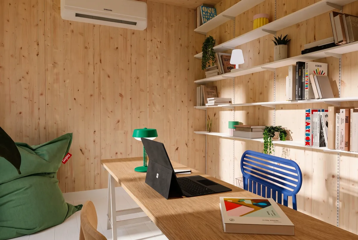 Intérieur du bureau de jardin Greenkub GK11 : plan de travail, étagères et parement en bois massif épicéa