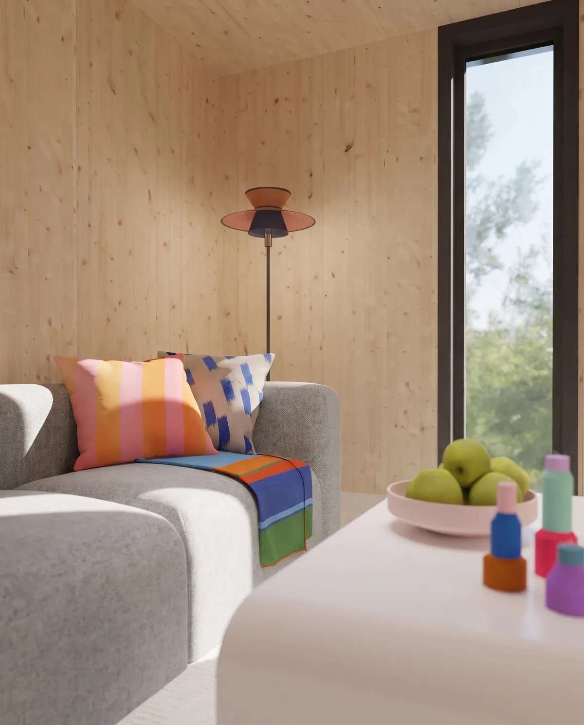 Intérieur du studio GK25 de 25 m² : coin salon d'accueil, baie vitrée et parement en bois massif épicéa