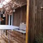 Extérieur d'un studio de jardin avec une terrasse