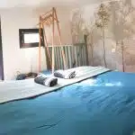 Chambre d'hôte aménagée dans un studio