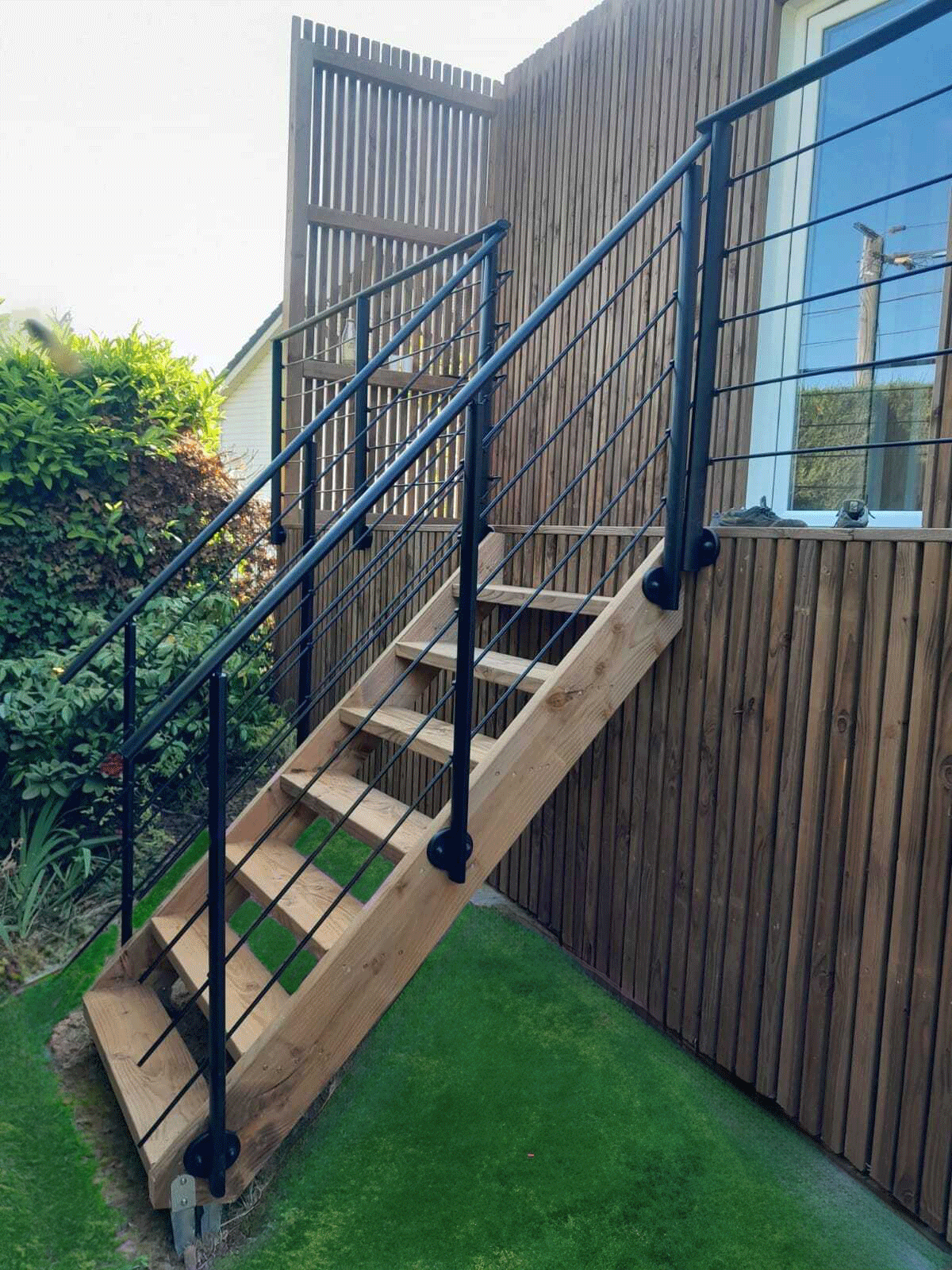 Escalier sur-mesure d'un studio de jardin